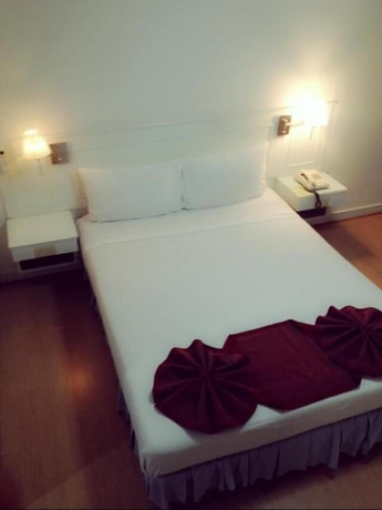 Imagen de la habitación del Hotel The Travellers. Foto 13