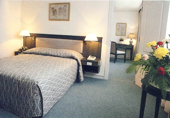 Imagen de la habitación del Hotel The Travellers. Foto 14