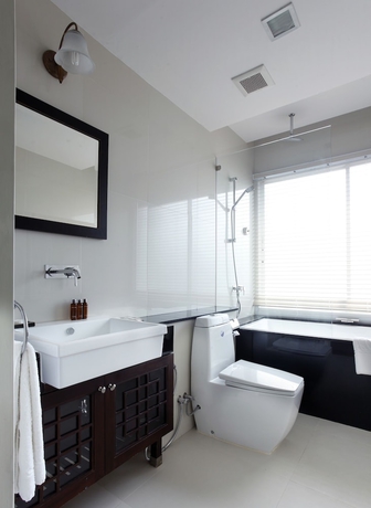 Imagen de la habitación del Hotel The Travellers. Foto 15