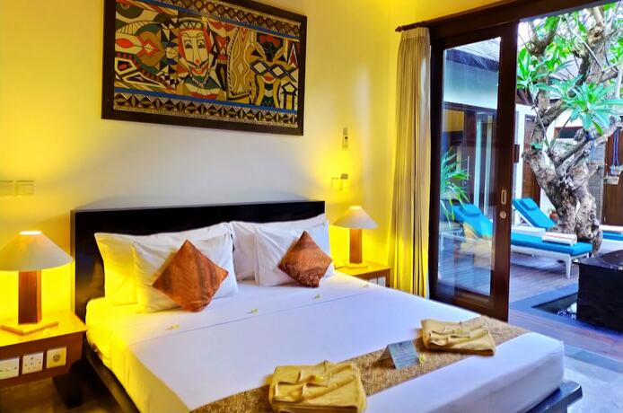 Imagen de la habitación del Hotel The Trawangan Resort. Foto 11