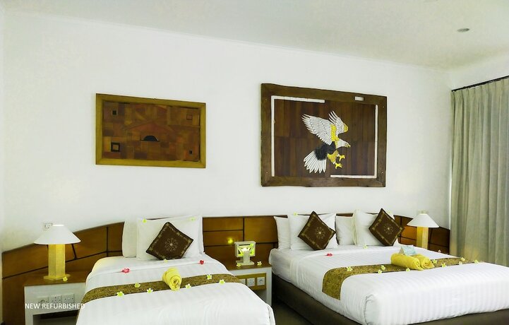 Imagen de la habitación del Hotel The Trawangan Resort. Foto 13