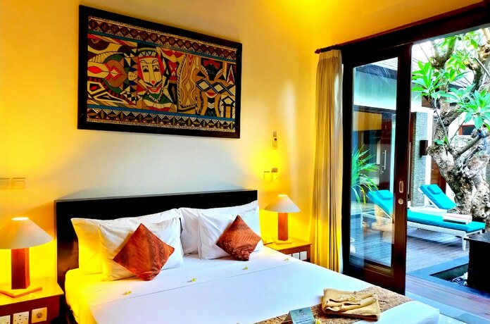 Imagen de la habitación del Hotel The Trawangan Resort. Foto 15