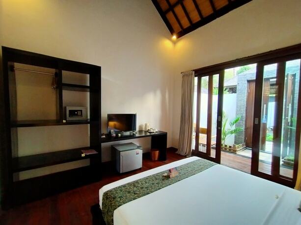 Imagen de la habitación del Hotel The Trawangan Resort. Foto 19