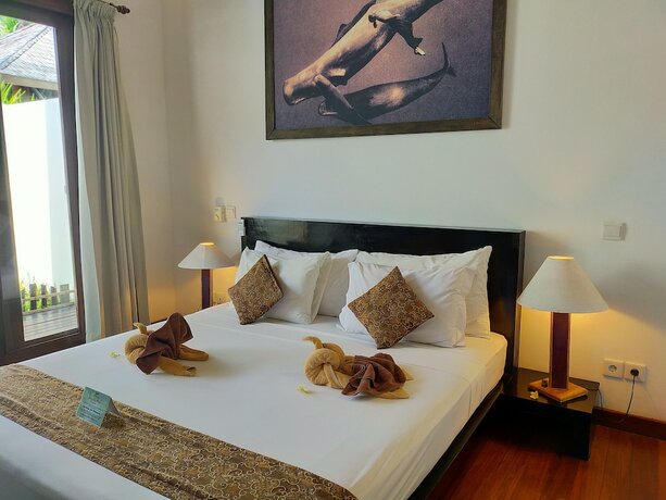 Imagen de la habitación del Hotel The Trawangan Resort. Foto 20