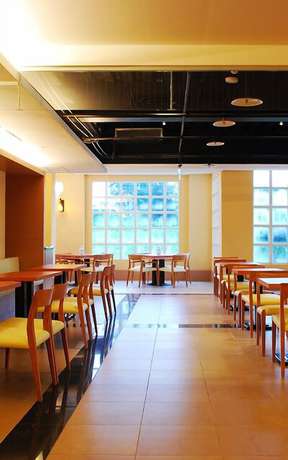 Imagen del bar/restaurante del Hotel The Treasure Land Resort. Foto 8