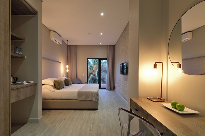 Imagen de la habitación del Hotel The Tree House Boutique. Foto 5