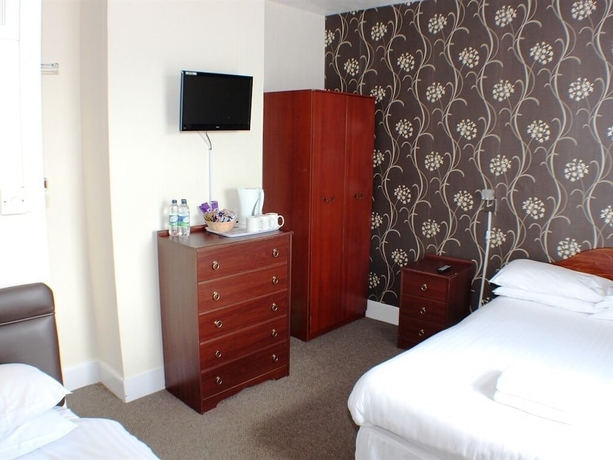 Imagen de la habitación del Hotel The Trevross. Foto 2