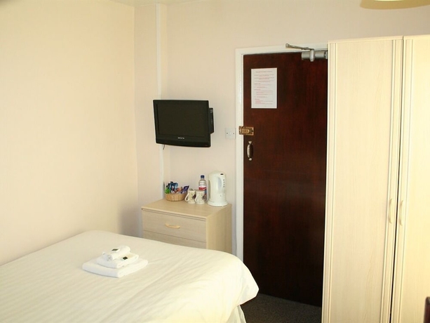 Imagen de la habitación del Hotel The Trevross. Foto 6