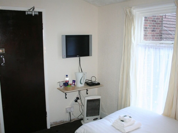 Imagen de la habitación del Hotel The Trevross. Foto 7