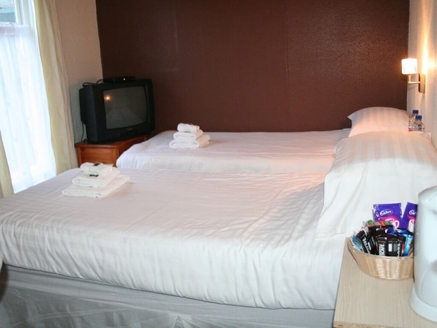 Imagen de la habitación del Hotel The Trevross. Foto 8
