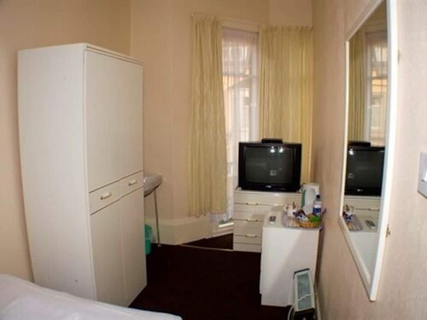 Imagen de la habitación del Hotel The Trevross. Foto 11