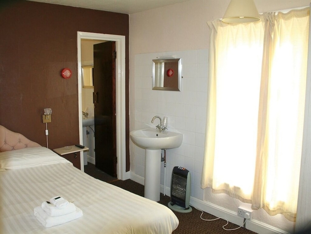 Imagen de la habitación del Hotel The Trevross. Foto 16