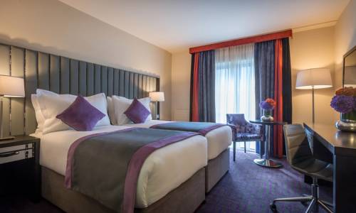 Imagen de la habitación del Hotel The Trinity City. Foto 8