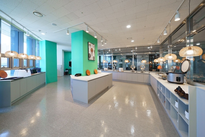 Imagen del bar/restaurante del Hotel The Triny Urban Suites. Foto 3