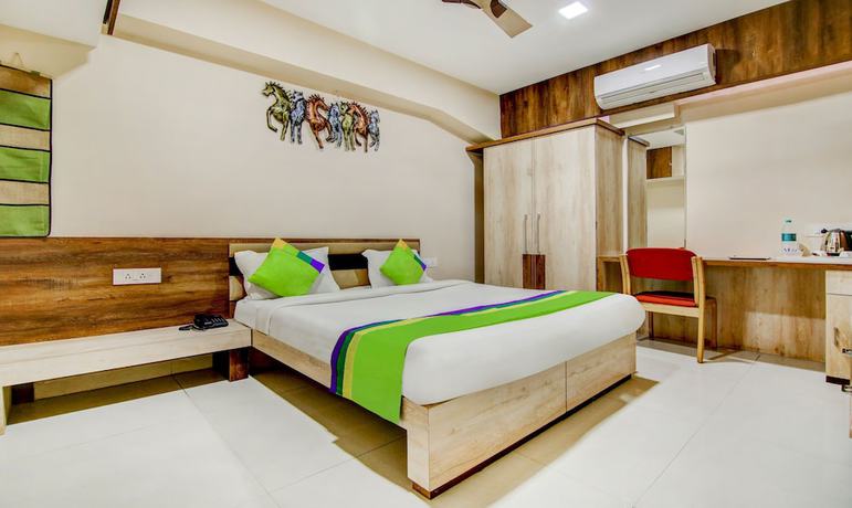 Imagen de la habitación del Hotel The Tripti. Foto 2