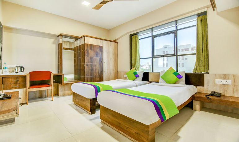 Imagen de la habitación del Hotel The Tripti. Foto 4
