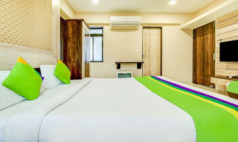 Imagen de la habitación del Hotel The Tripti. Foto 5
