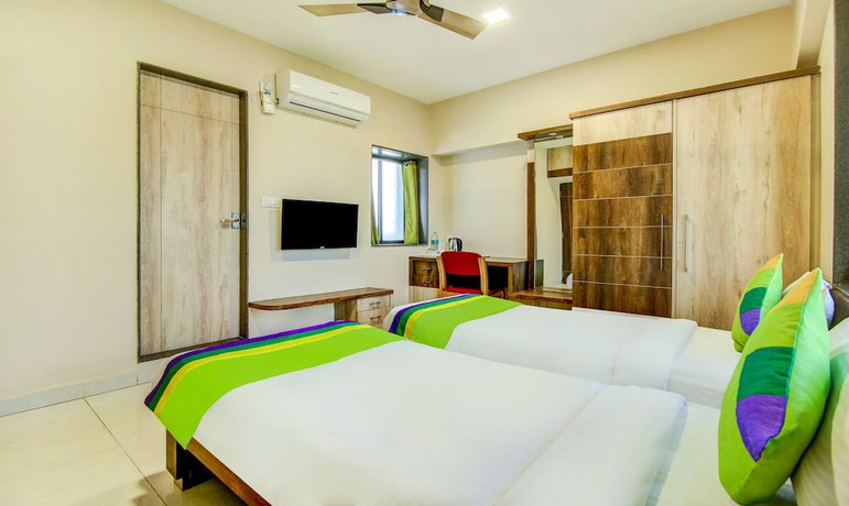 Imagen de la habitación del Hotel The Tripti. Foto 6