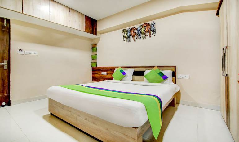 Imagen de la habitación del Hotel The Tripti. Foto 7