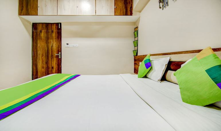 Imagen de la habitación del Hotel The Tripti. Foto 8