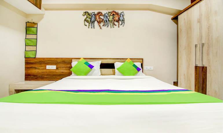 Imagen de la habitación del Hotel The Tripti. Foto 10