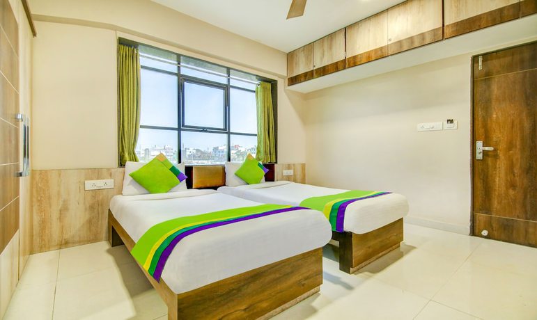 Imagen de la habitación del Hotel The Tripti. Foto 12