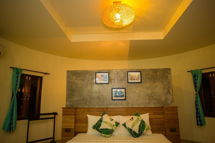 Imagen de la habitación del Hotel The Tropical Beach Resort. Foto 6