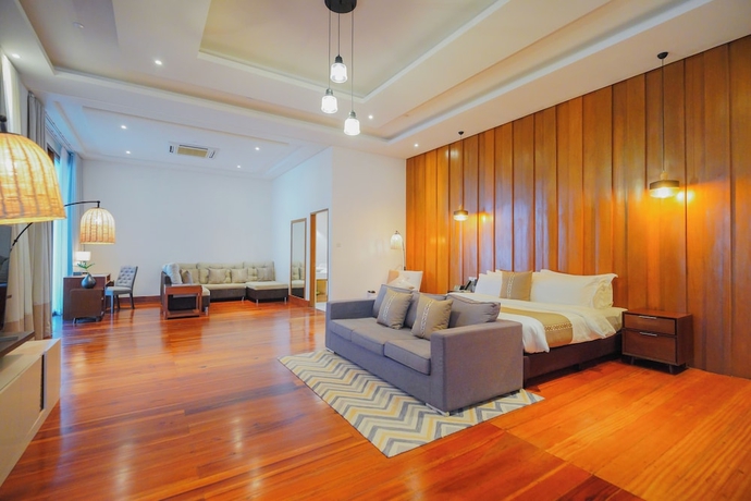 Imagen de la habitación del Hotel The Tropics at MacArthur Park Resort and Convention Center. Foto 5