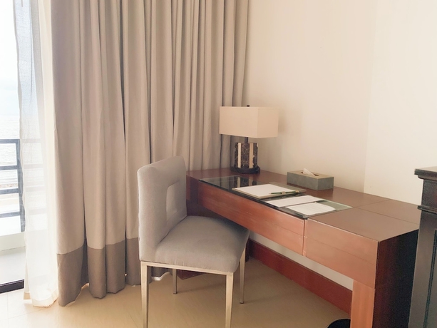 Imagen de la habitación del Hotel The Tropics at MacArthur Park Resort and Convention Center. Foto 8