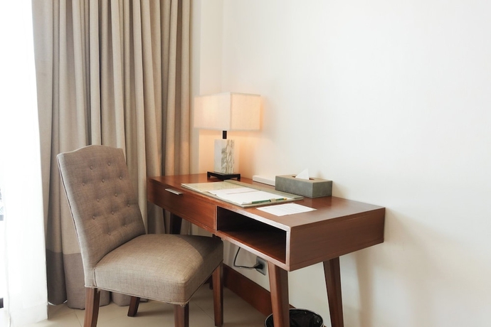 Imagen de la habitación del Hotel The Tropics at MacArthur Park Resort and Convention Center. Foto 13