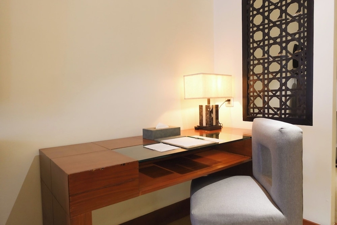 Imagen de la habitación del Hotel The Tropics at MacArthur Park Resort and Convention Center. Foto 14