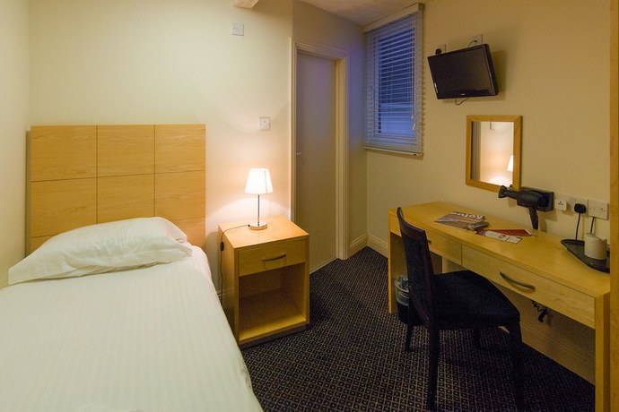 Imagen de la habitación del Hotel The Trouville. Foto 18