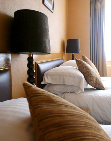 Imagen de la habitación del Hotel The Trouville. Foto 20