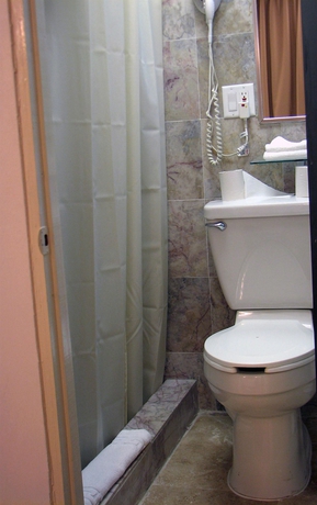 Imagen de la habitación del Hotel The Tryst Beachfront. Foto 3