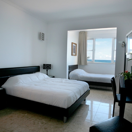 Imagen de la habitación del Hotel The Tryst Beachfront. Foto 9
