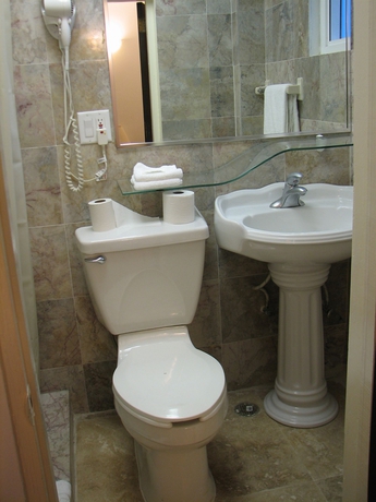 Imagen de la habitación del Hotel The Tryst Beachfront. Foto 11