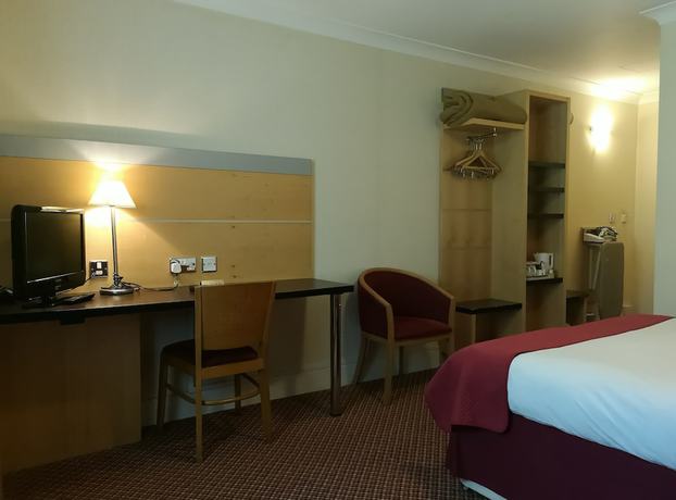 Imagen de la habitación del Hotel The Tudor. Foto 11