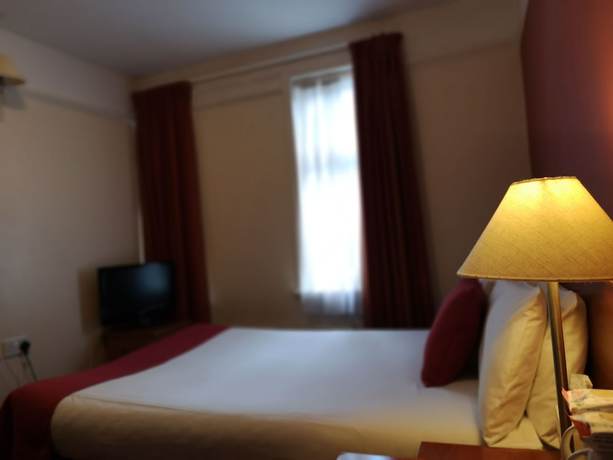 Imagen de la habitación del Hotel The Tudor, Londres. Foto 13