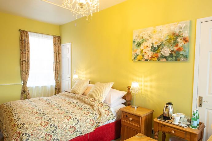 Imagen de la habitación del Hotel The Tudor Rose. Foto 9