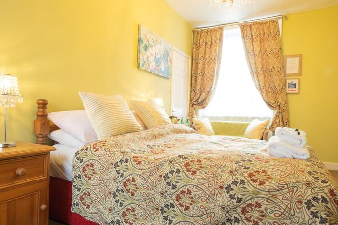 Imagen de la habitación del Hotel The Tudor Rose. Foto 12