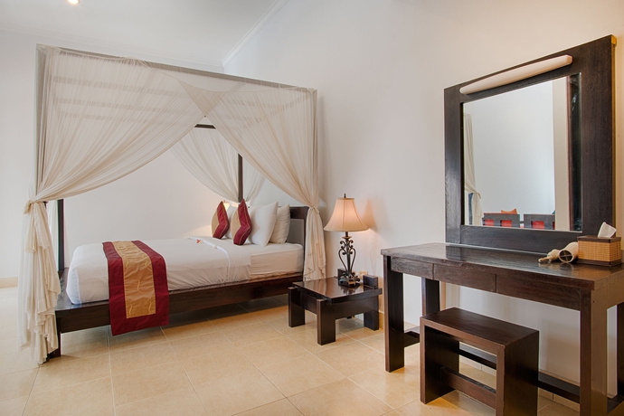 Imagen de la habitación del Hotel The Tukad Villa. Foto 4