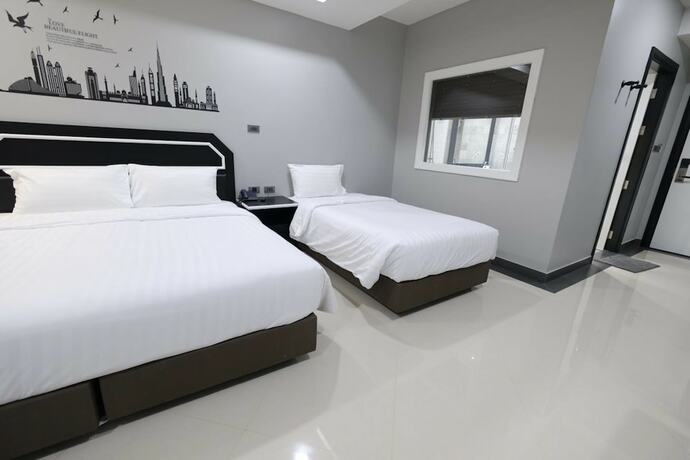 Imagen de la habitación del Hotel The Tung. Foto 15
