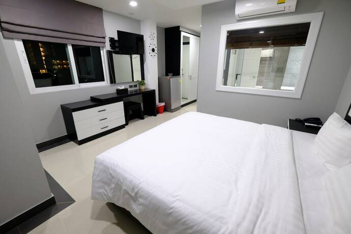 Imagen de la habitación del Hotel The Tung. Foto 16