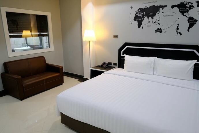Imagen de la habitación del Hotel The Tung. Foto 17