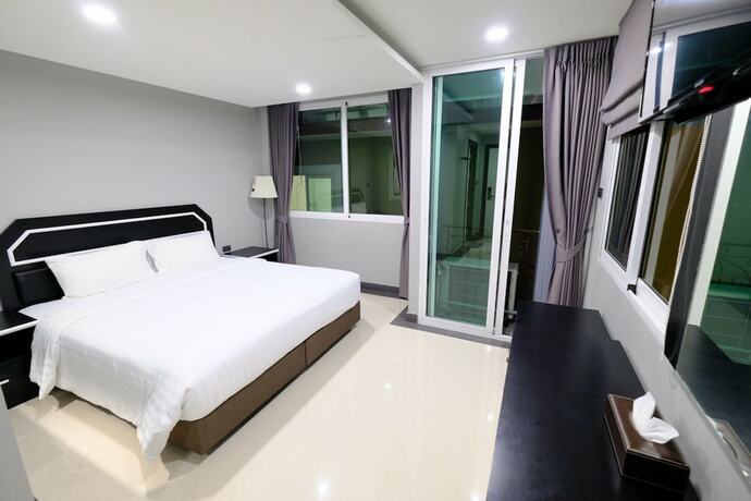 Imagen de la habitación del Hotel The Tung. Foto 19