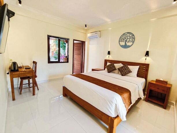 Imagen de la habitación del Hotel The Tunjung Boutique Resort. Foto 14