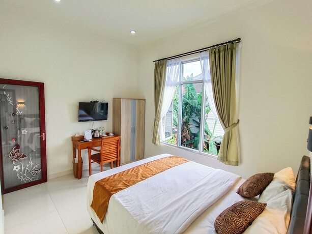 Imagen de la habitación del Hotel The Tunjung Boutique Resort. Foto 16