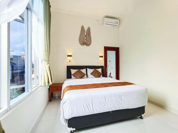 Imagen de la habitación del Hotel The Tunjung Boutique Resort. Foto 18