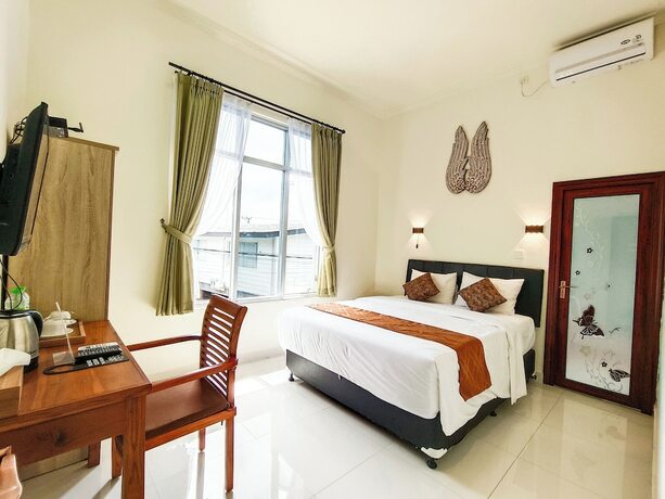 Imagen de la habitación del Hotel The Tunjung Boutique Resort. Foto 20