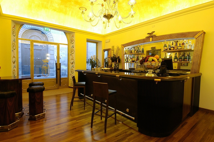 Imagen del bar/restaurante del Hotel The Tuscanian. Foto 3